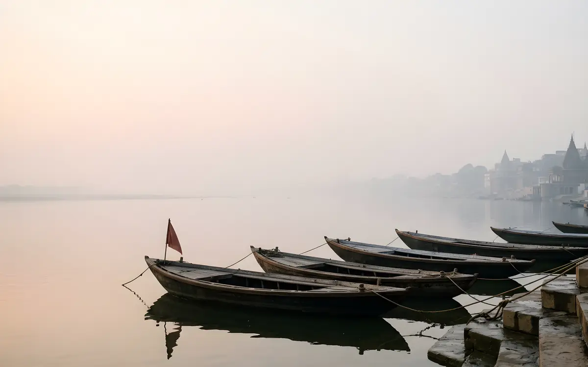 Wooden boats moored at the ghats on the River Ganga at dawn